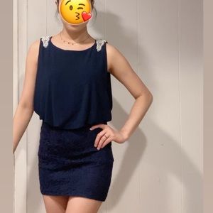 Dark blue dress with lace skirt detail